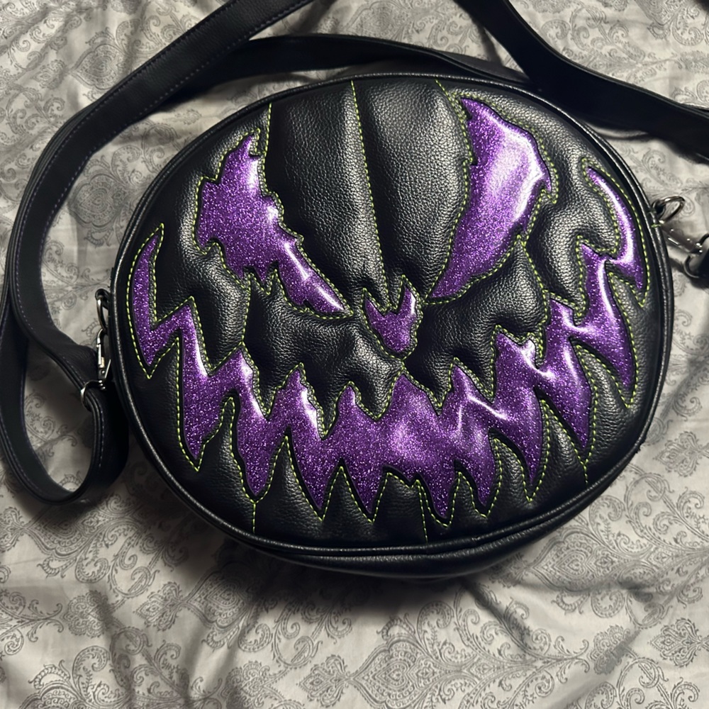Pumpkin kult limited edition purple and black pumpkin bag.